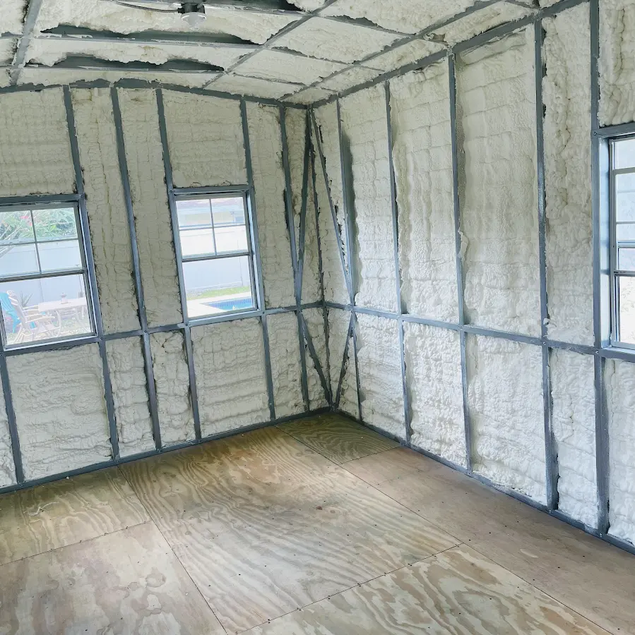 Closed-cell spray foam insulation applied to wall cavities in a residential project in Central